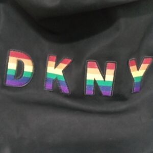 DKNY RAISED RAINBOW LETTER HEAVYWEIGHT DRAWSTRING BACPACK W MULTIPLE POCKETS